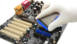 Engineer installing a hardware component